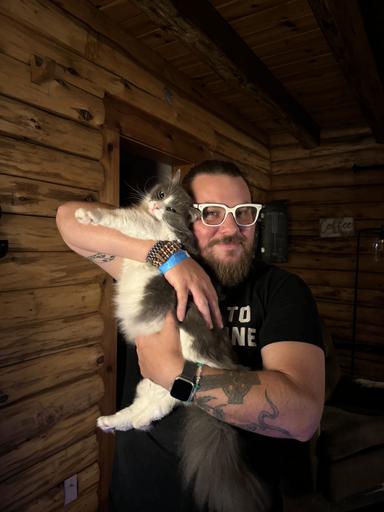 Kris Coleman and his beloved cat, Bubba Beans