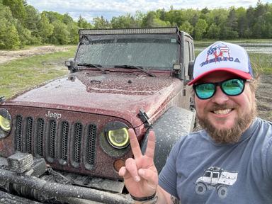 Kris Coleman and his Jeep, off-roading in Michigan